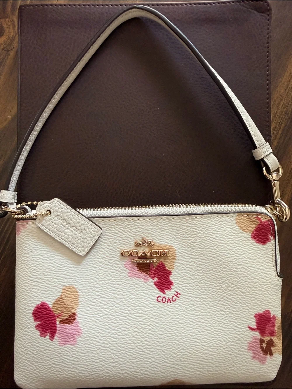 Coach Cream Floral Pebbled Leather Wristlet with Gold Logo